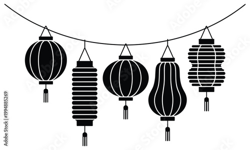 Decorative oriental lanterns hanging on a string for festive occasions.