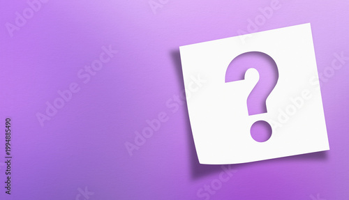 Note paper with question mark on panoramic purple background