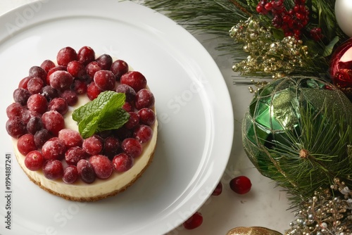 Delicious Tart With Cream, Cranberries, and Mint on a Green Table During the ...