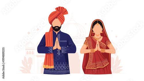 Beautiful Indian bride and groom dressed in traditional wedding attire performing a namaste greeting in front of a temple.