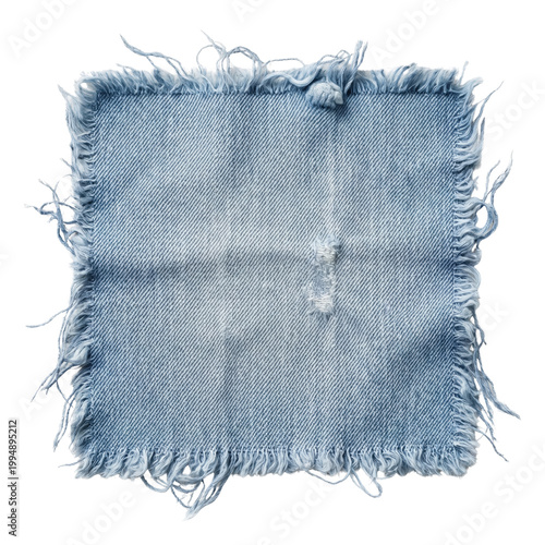 Konstfotografi Light blue distressed denim patch with frayed edges
