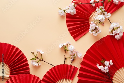 Colorful Red Decorations and White Flowers Arranged on a Light Background for...