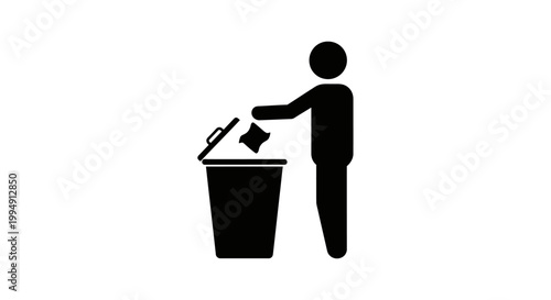 Person discarding trash into a bin a stark black silhouette