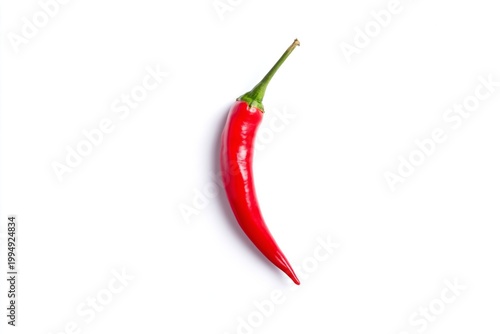Red Chili Pepper Placed on a White Background in a Simple Setup for Display
