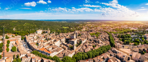 Fotografie Overlooking Uzes in Gard, France, this scene captures the charming stone buildings and rooftops of the city