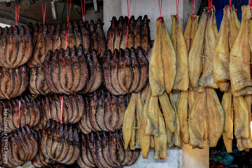 Bustling Outdoor Market with Artisanal Dried Fish Display