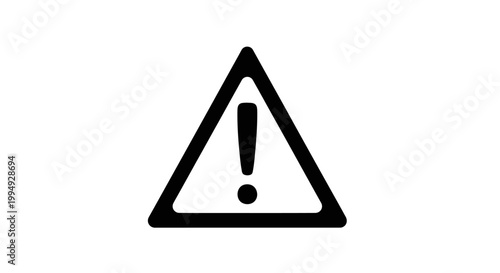 Black triangle warning sign with exclamation point a stark silhouette