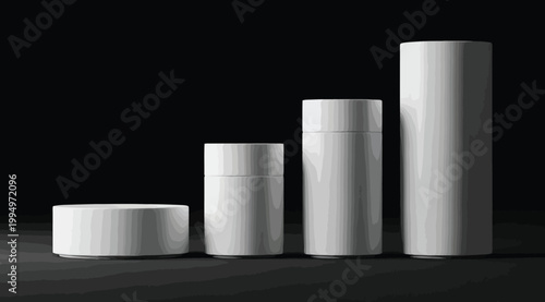 Set of white cylindrical containers of different heights