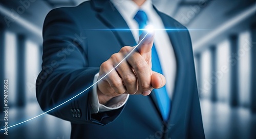 Businessman pointing at a glowing rising growth chart graph