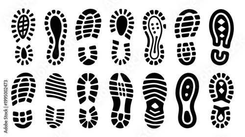 Collection of diverse black shoe footprints and sole prints set on white background with footprint, collection