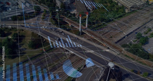 Displaying multi-lane highway overpass and rail tracks crossing corridor, with analytics overlays
