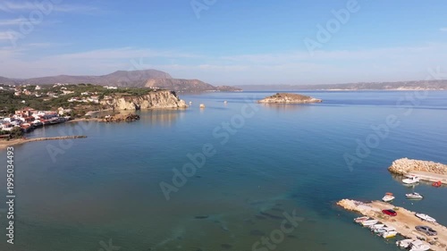 Aerial drone shot.View of famous beach in the summer, Crete, Greece. Famous beach with river and palm trees in Libyan sea. Tropical island, Panoramic view, Most beautiful beaches of Crete island