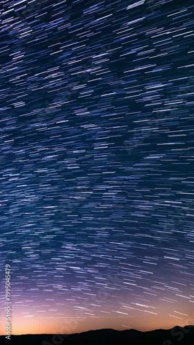 Vertical Shot Milky Way Galaxy Star Trails and Trona Pinnacles Astrophotography Night Sky Time Lapse in California USA