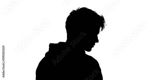 Silhouette of a young man in profile against a white background