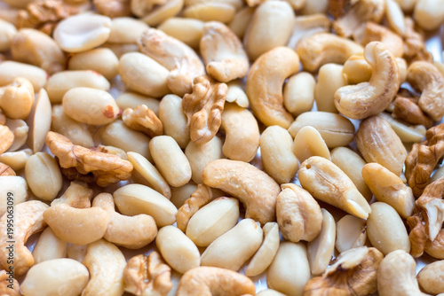 Nuts texture peanuts cashew walnut close up background 