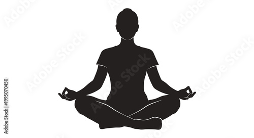 Silhouette of a woman practicing yoga in a meditative lotus position