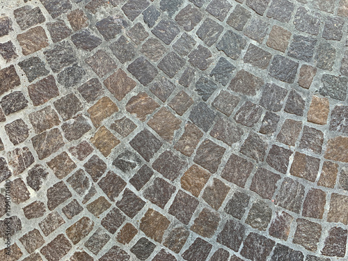 Cobblestone pavement, traditional European street texture, rustic outdoor surface