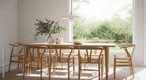 A bright, Scandinavian-style dining room with a long wooden table and designer chairs, situated in front of a large window overlooking a lush green garden.