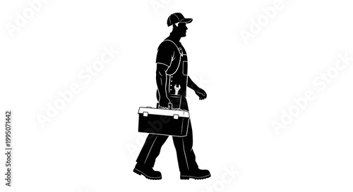 Silhouette of a worker carrying a toolbox while walking forward