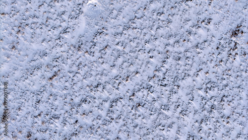 Bilde på lerret Abstract Winter Snow Texture on Dark Ground Top View