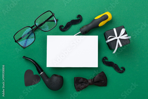 Happy Father's Day accessories on color background, top view