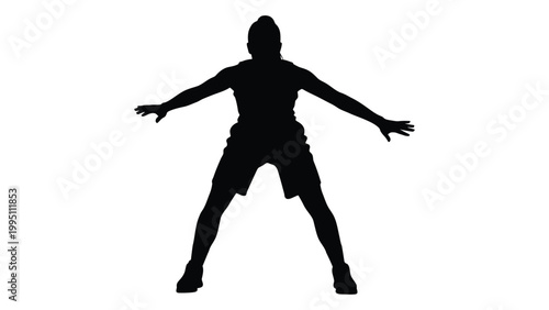 Silhouette of a person in a dynamic pose arms outstretched suggesting movement