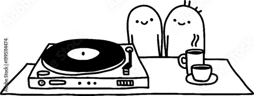 Turntable with two smiling characters and cups on table