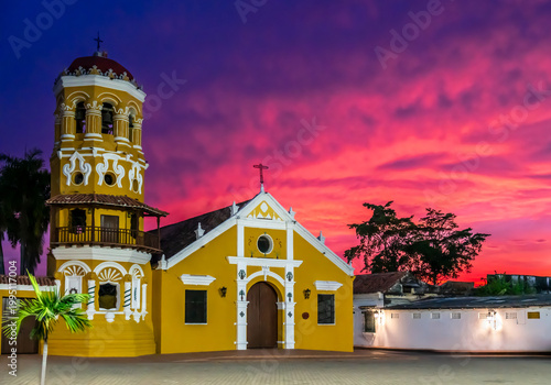 Bilde på lerret Colombia, colorful sunset over the  Santa Barbara church in Santa Cruz de Mompós