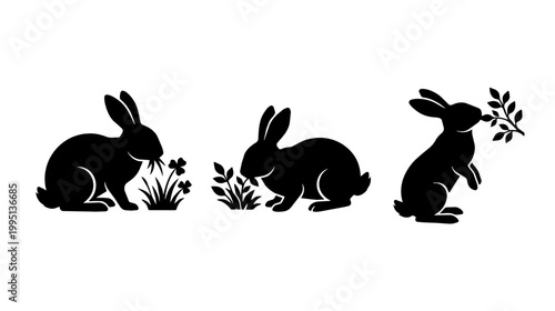 Rabbits nibbling plants on a white studio background. Black silhouette illustrations create a playful mood.
