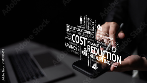 Fotografi This image illustrates the concept of cost reduction and budgeting, featuring key terms on a dark background