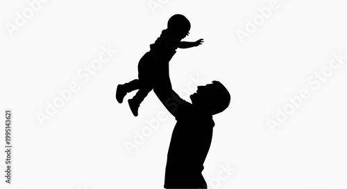 The silhouette of a father holding his child in the air