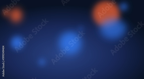 Glowing blue and orange bokeh lights on dark background in moody atmospheric lighting for cinematic