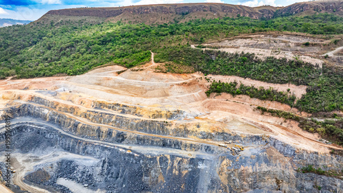 Foto Mines of extraction and processing of limestone inside of the Cafuringa Environmental Protection Area, causing devastation, pollution by cement factories