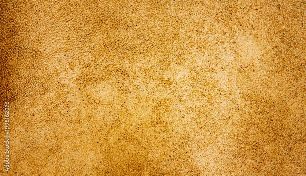 Fototapeta premium Suede texture of yellow retro color as a background macro photo.
