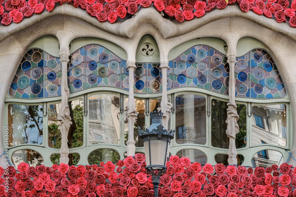 Fototapeta premium Modernist Windows of Casa Batllo Decorated with Floral Garlands, Sant Jordi, Spain