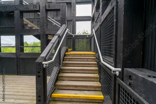 The Tur Viewing Platform at Cuningar Loop, Scotland, UK, is a landmark viewing platform and lookout tower providing elevated, treetop views across the woodland park, the River Clyde, the Hope statue. 