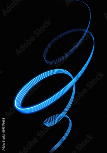 Abstract flowing blue light streaks creating an elegant spiraling vortex shape against a stark black background signifying motion and energy