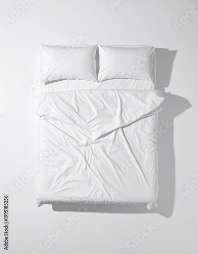 White bedding comforter and pillow set on light for home furnishing, clean minimal interior and laundry comfort