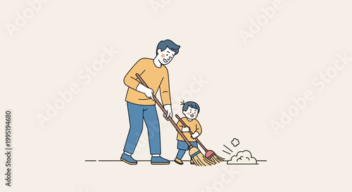 Father teaches son sweeping leaves on driveway in suburban neighborhood on sunny day