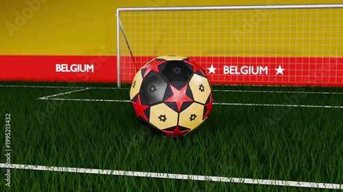 Spinning soccer ball descending and rolling toward goal on turf, BELGIUM wall showing red stars