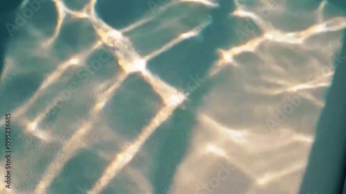 Sunlight patterns on water surface, abstract background, tranquil and serene, bright reflections