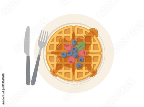 Top view of delicious waffle served with berries and syrup on a plate.