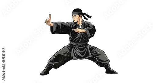 Martial artist in black gi, performing defensive stance