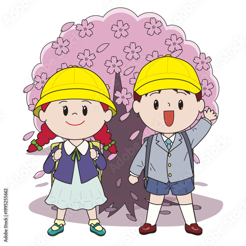 桜の前に立つ小学生の男の子と女の子