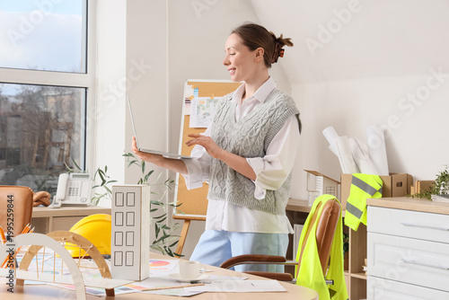 Female architect working wi...