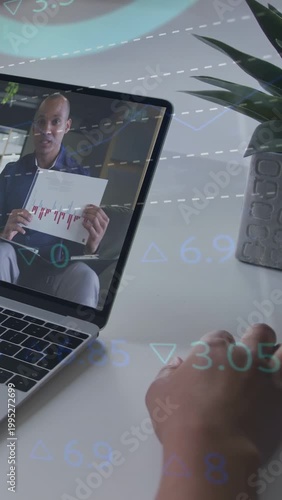 Vertical video: Hand hovering keys nudging host holding red chart showing finance overlaying frame