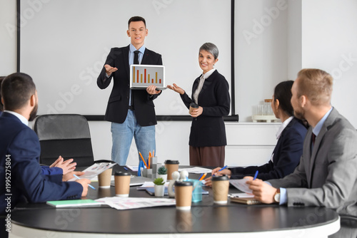 Group of people working wit...