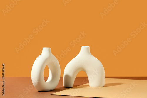 Different vases on color ba...
