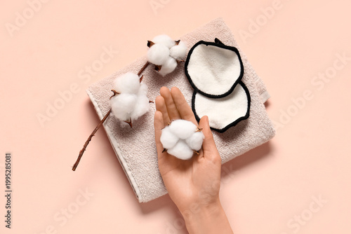 Female hand with towel, reu...