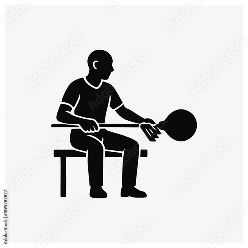Silhouette of a person sitting and using a slingshot